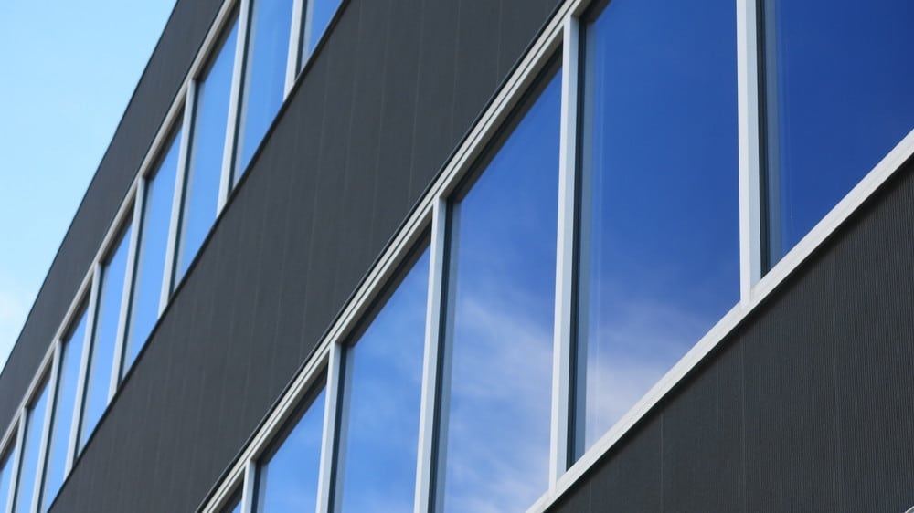 CERACLAD Zen Garden panels in Charcoal installed across a full building facade