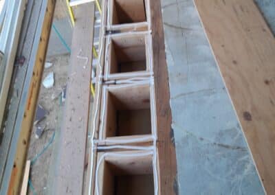 Ladder access on an elevation during the re-side at Phoenix Court Apartments.