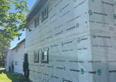 HardieWrap weather barrier being installed at Phoenix Court Apartments.