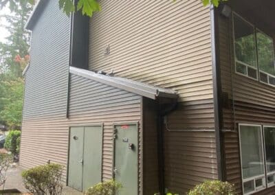 The original cladding at Redmond Park before Side-Pro removed it.