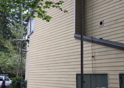 James Hardie siding being installed over the rainscreen at Redmond Park.