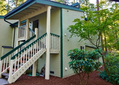 Finished siding, railings and covered porch at Westboro Condos.