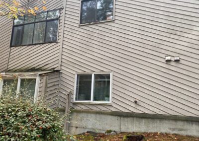 Weathered and failing lap siding at Westboro Condos, Federal Way WA.