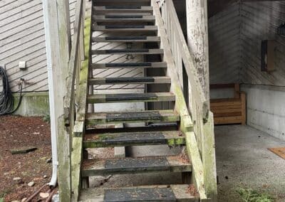 Worn exterior stair at Westboro Condos before the renovation.